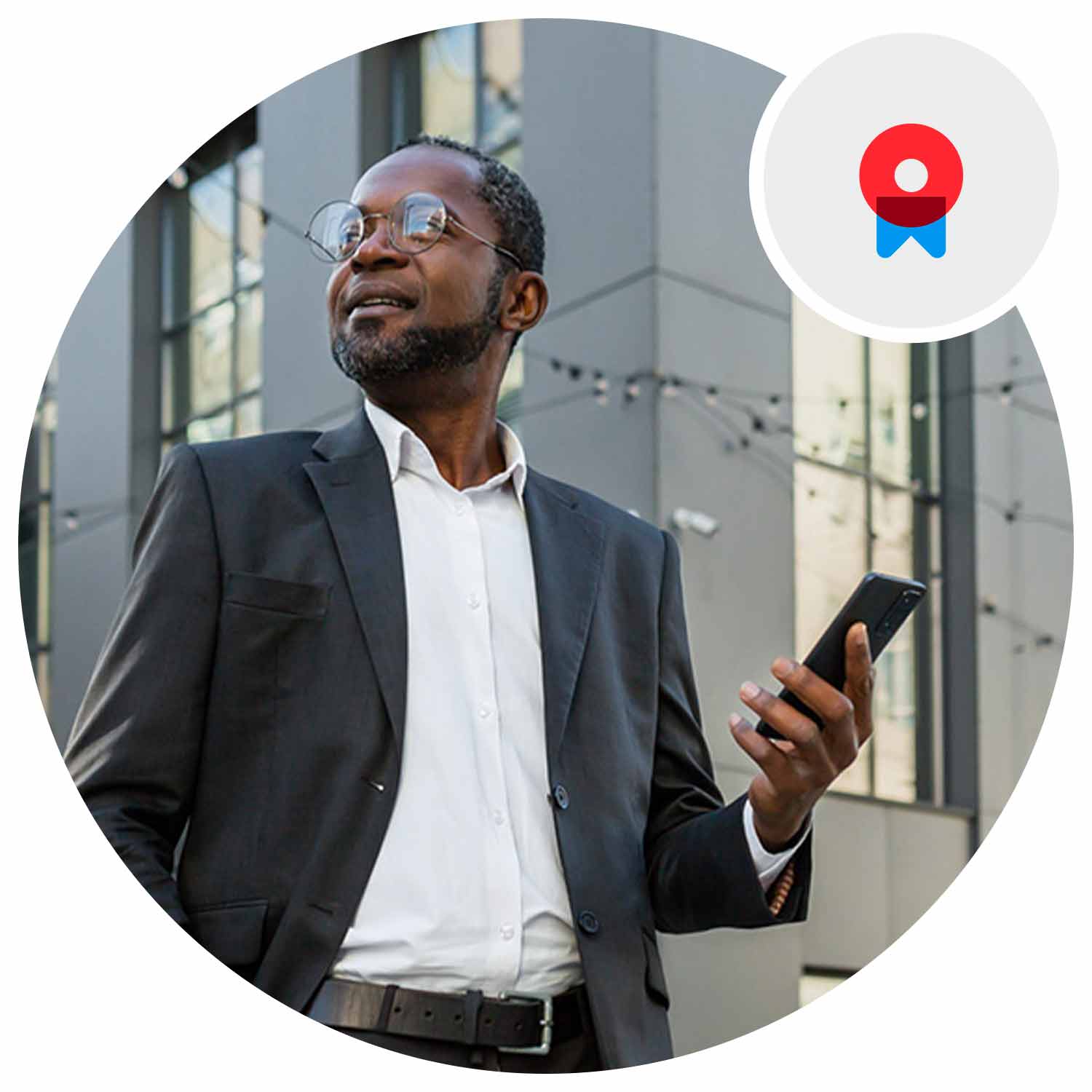 Man holding phone with Buildings on the background