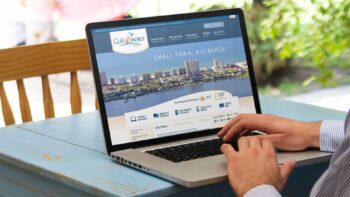 Laptop displaying the Gulf Shores, Alabama website homepage