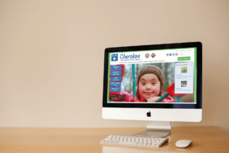 Computer displaying the County's recreation agency homepage, optimized with CivicPlus Recreation Management software.