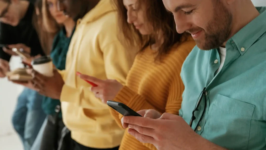 Group looking at cell phones
